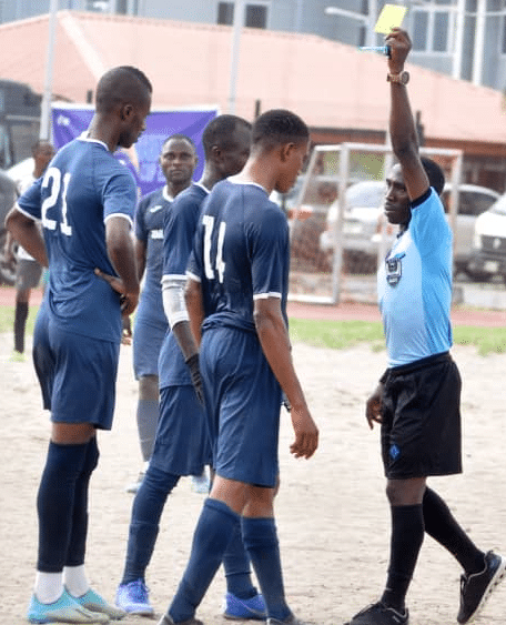 A Nigerian Navy player bags yellow card during their match against Nigeria Customs Service at the NPA Sports Ground on Thursday.