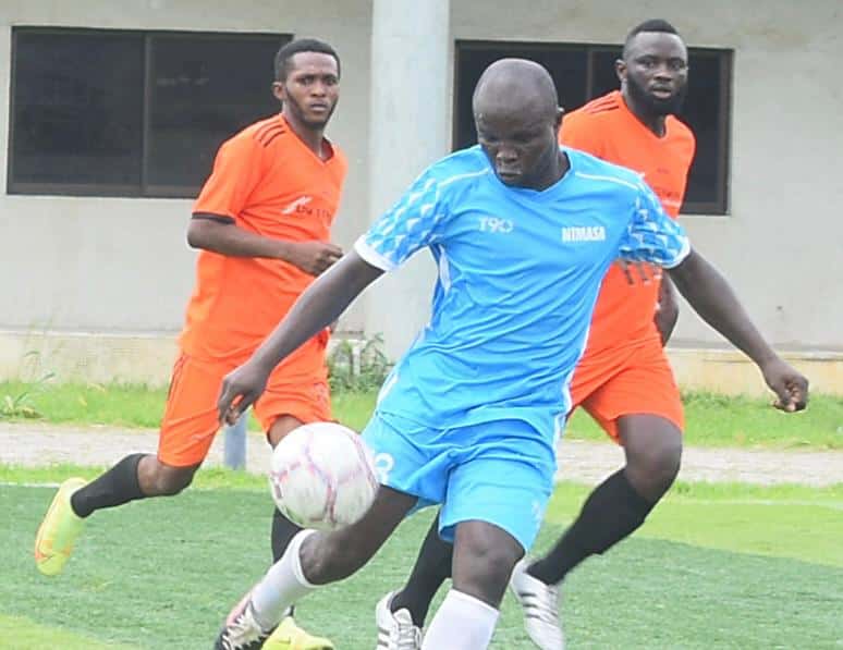 APM Terminals Apapa and NIMASA players in action during their group match on Wednesday.