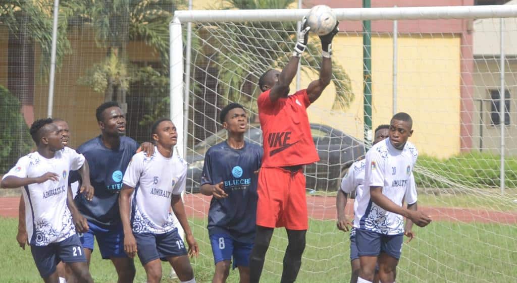 Blueche Lomado and Nigerian Navy players 